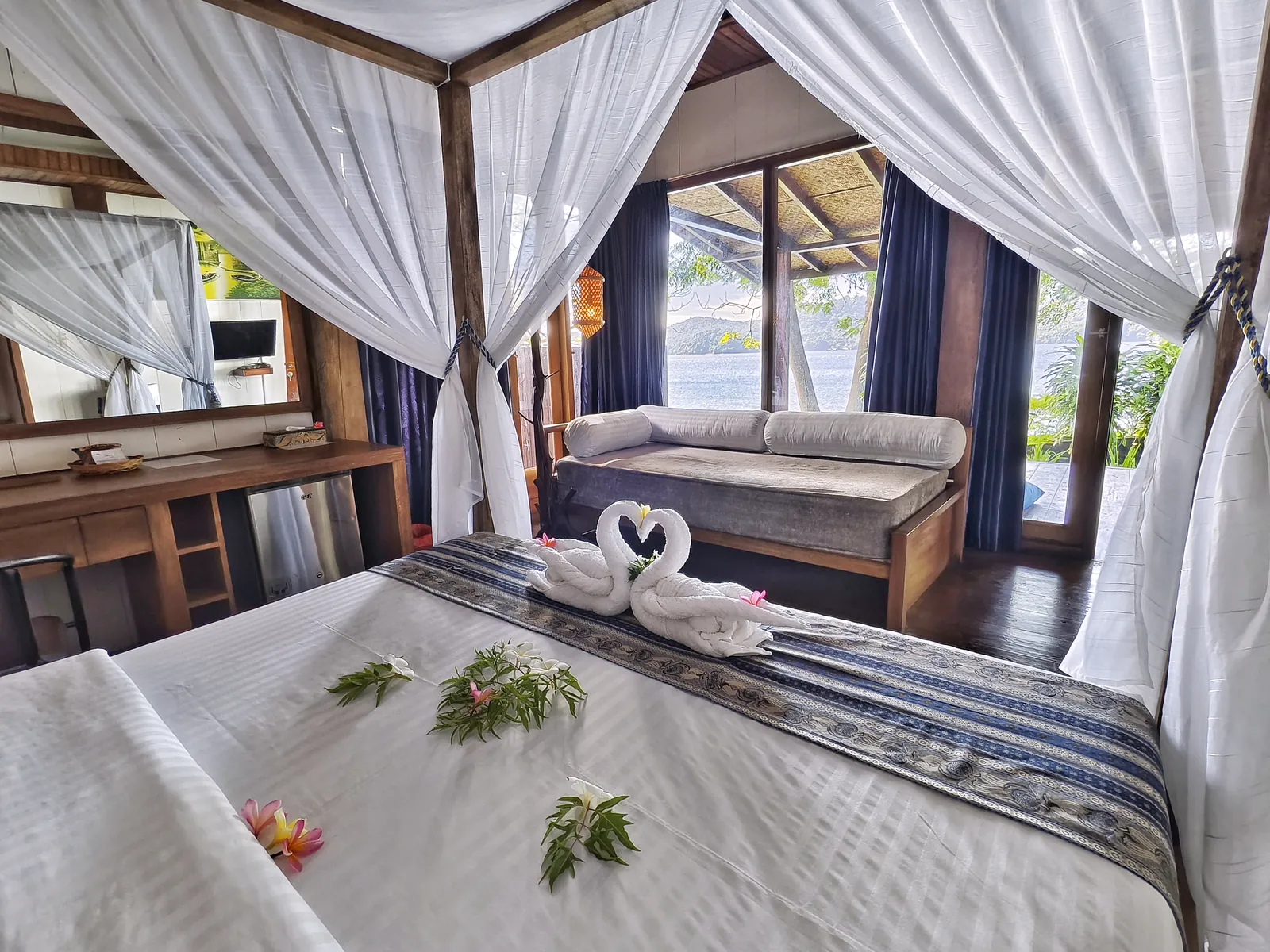 Bungalow bedroom with four-poster bed