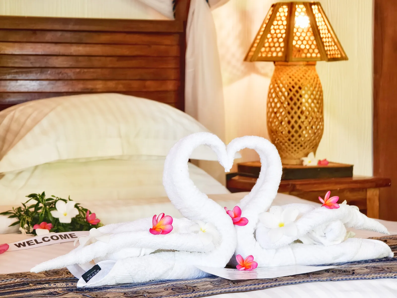Towel swans on the bed at check-in